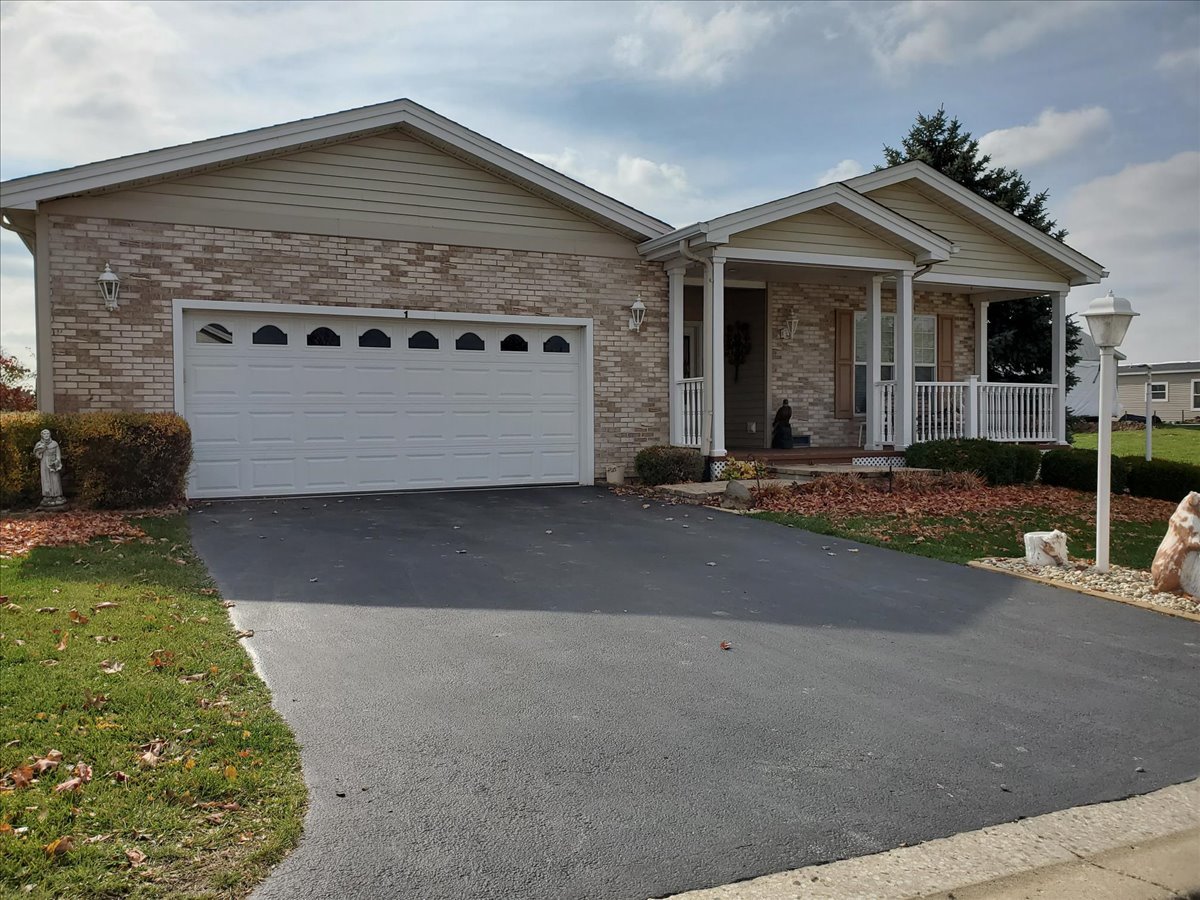 1 Suffolk Way Grayslake, IL 60030 - Photo 54 of 54 a front view of a house with garden