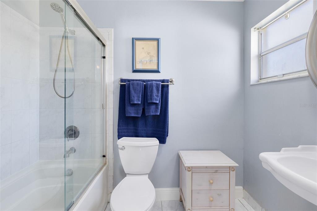 5331 Maize Street Orlando, FL 32821 - Photo 19 of 35 a bathroom with a toilet and a shower