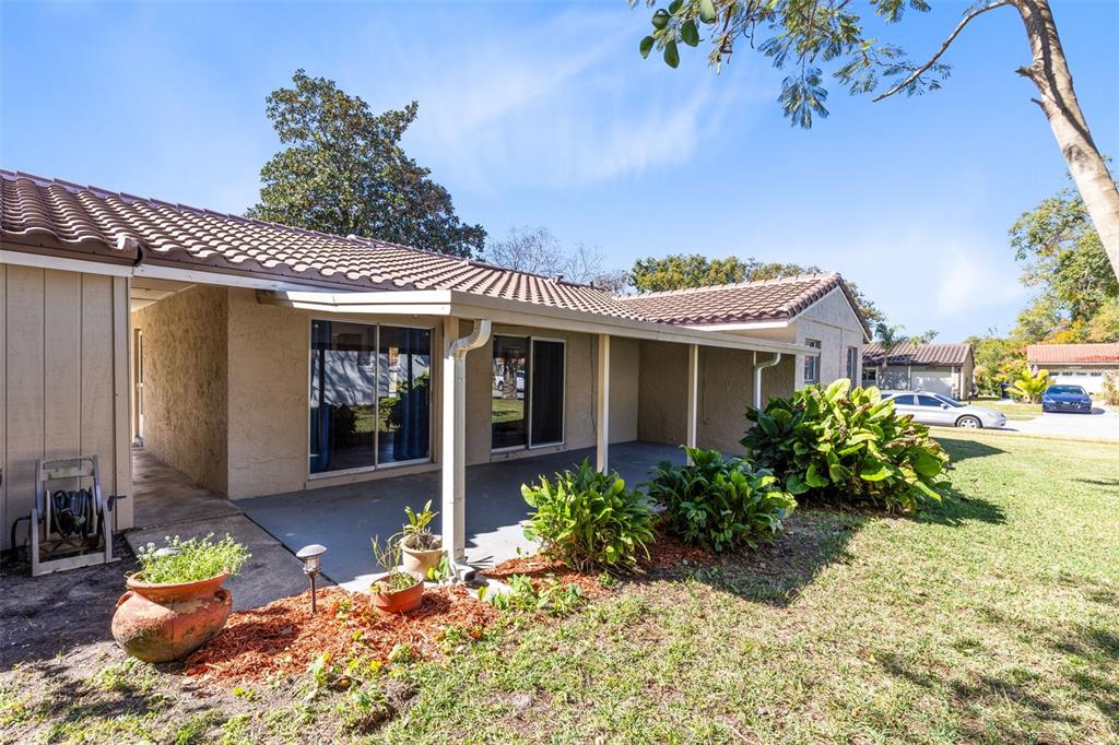 5331 Maize Street Orlando, FL 32821 - Photo 26 of 35 a front view of a house with a porch