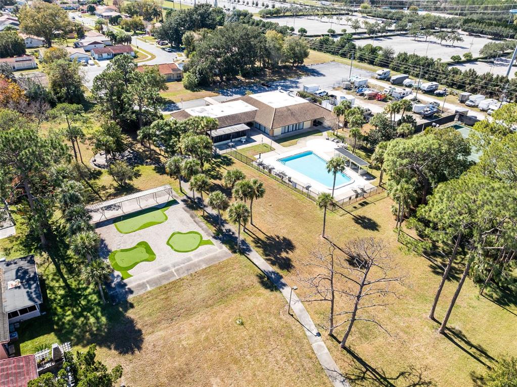 5331 Maize Street Orlando, FL 32821 - Photo 31 of 35 an aerial view of a swimming pool and mountain