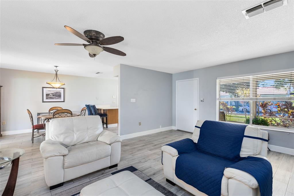 5331 Maize Street Orlando, FL 32821 - Photo 7 of 35 a living room with furniture and a window