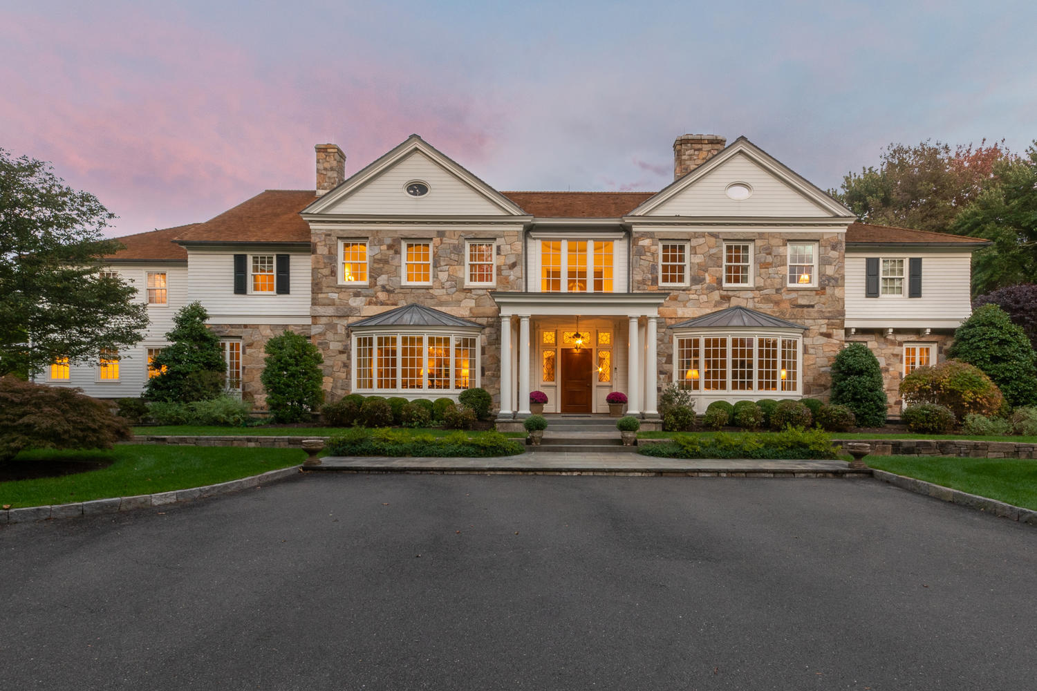 300 Brookside Road Darien, CT 06820 - Photo 1 of 58 a front view of a house with a yard