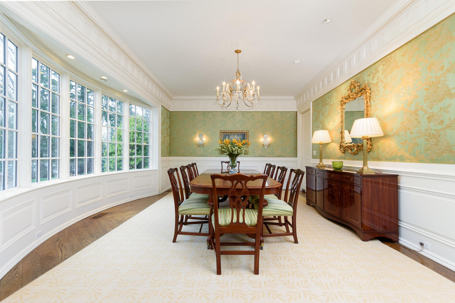 300 Brookside Road Darien, CT 06820 - Photo 11 of 58 a view of a dining room with furniture and a chandelier