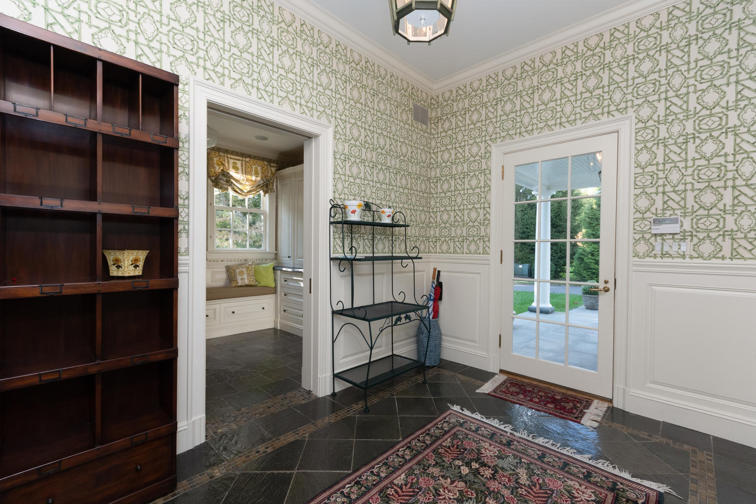300 Brookside Road Darien, CT 06820 - Photo 22 of 58 a view of a livingroom with furniture and front door
