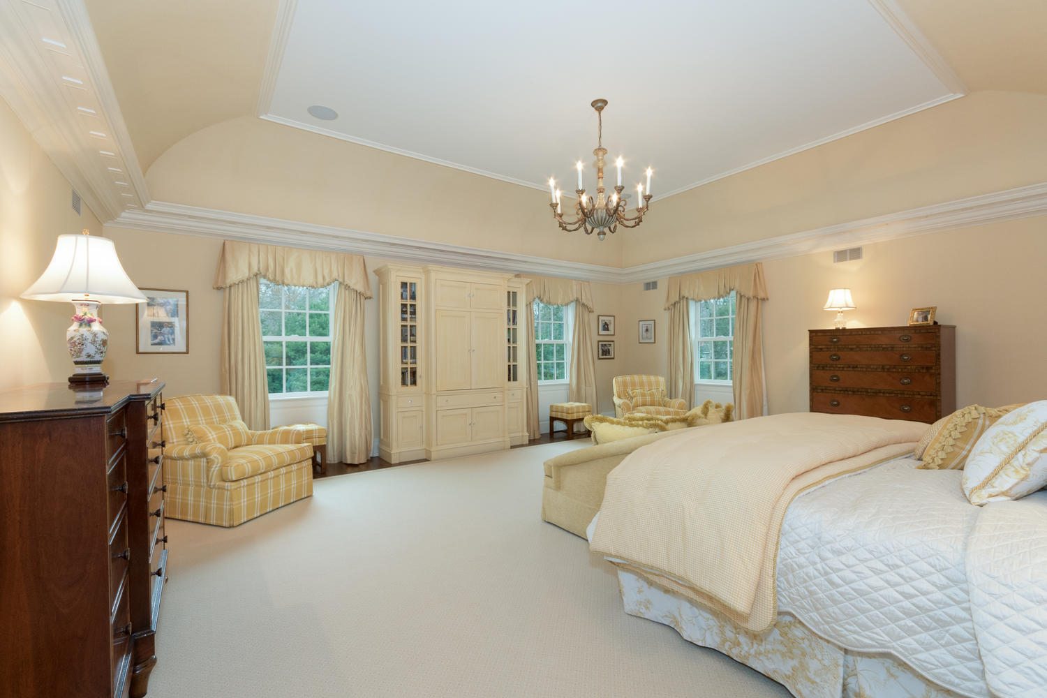 300 Brookside Road Darien, CT 06820 - Photo 26 of 58 a spacious bedroom with a bed and glass windows