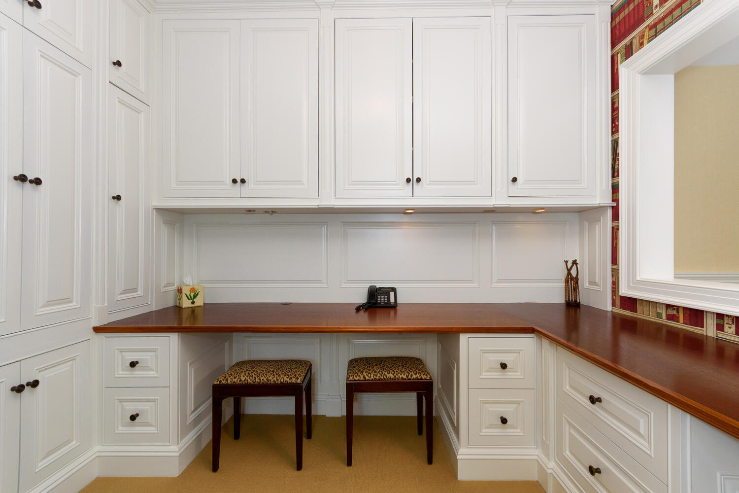 300 Brookside Road Darien, CT 06820 - Photo 38 of 58 a kitchen with white cabinets and a sink