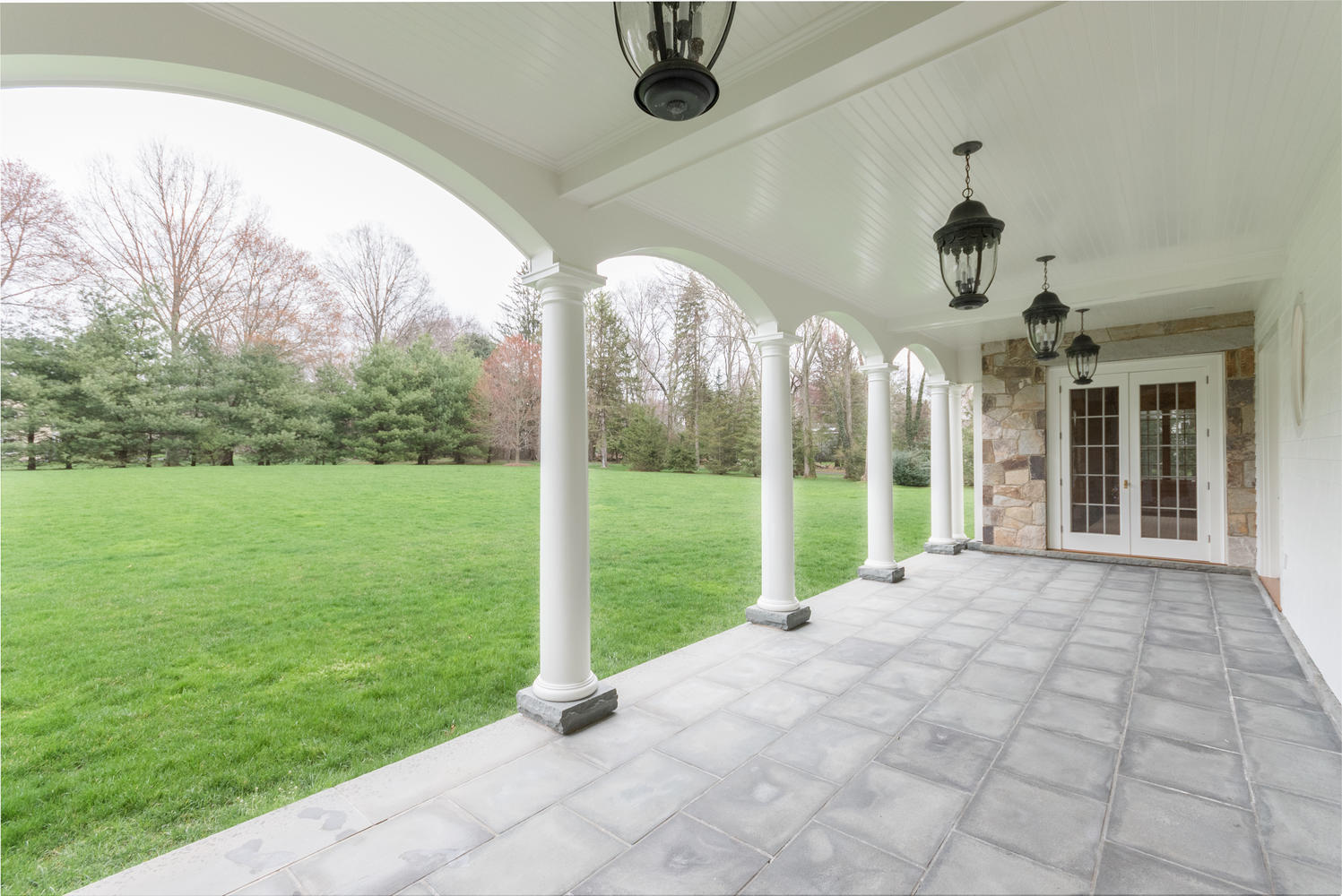 300 Brookside Road Darien, CT 06820 - Photo 48 of 58 a view of an entryway with garden