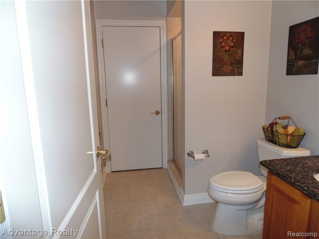 6960 West Gates Street Romeo, MI 48065 - Photo 22 of 91 1st floor bath with a shower that opens to the pool! Perfect to shower after a dip!!