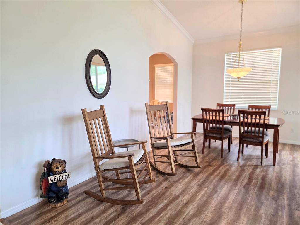 9222 Bonnington Drive Trinity, FL 34655 - Photo 28 of 37 a view of a dining room with furniture window and wooden floor
