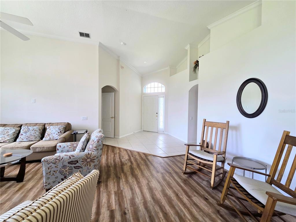 9222 Bonnington Drive Trinity, FL 34655 - Photo 29 of 37 a living room with furniture and a wooden floor