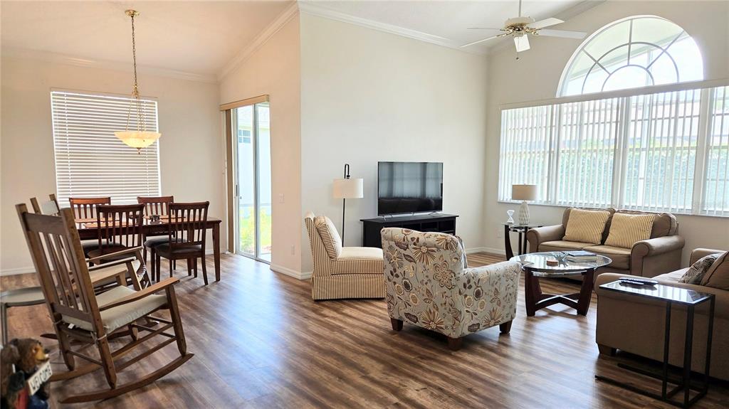 9222 Bonnington Drive Trinity, FL 34655 - Photo 3 of 37 a living room with furniture and a large window