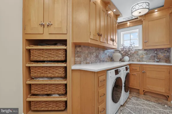 a front view of a building with a yard