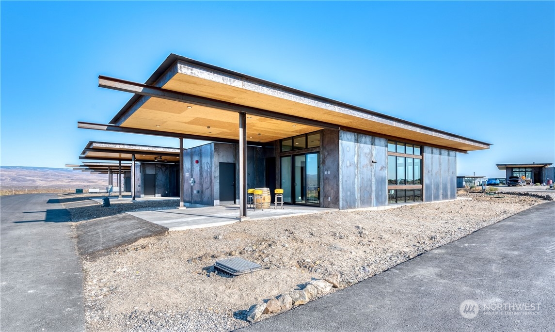 a front view of a house with a patio