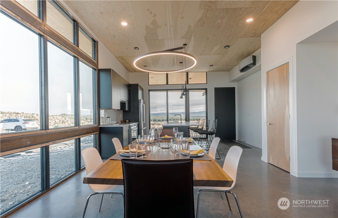 240 Northwest Rattlesnake Point Road Quincy, WA 98848 - Photo 13 of 37 a view of a dining room with furniture window and outside view