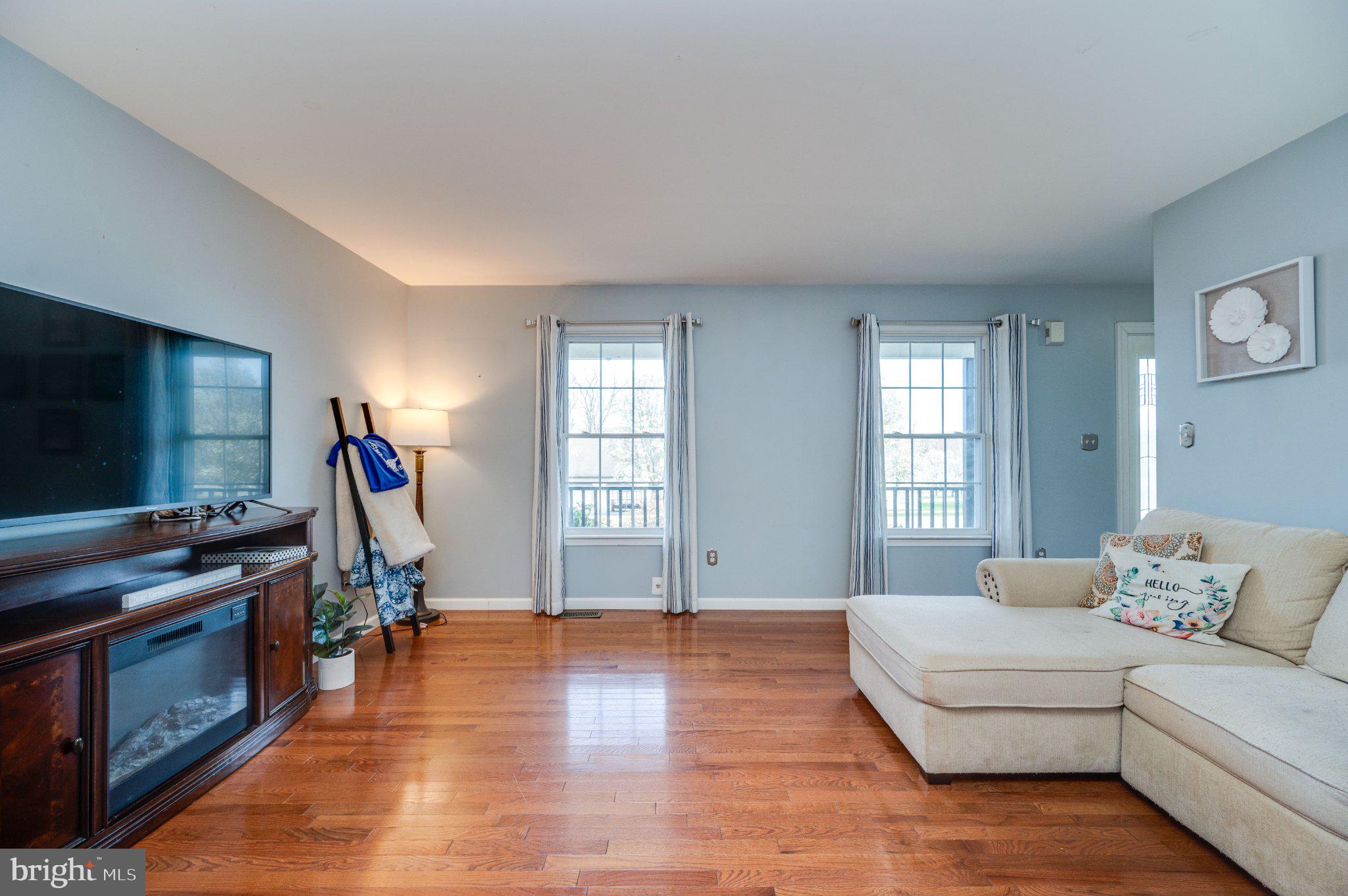 4870 Dunham Drive Reading, PA 19606 - Photo 15 of 59 a living room with furniture and a flat screen tv