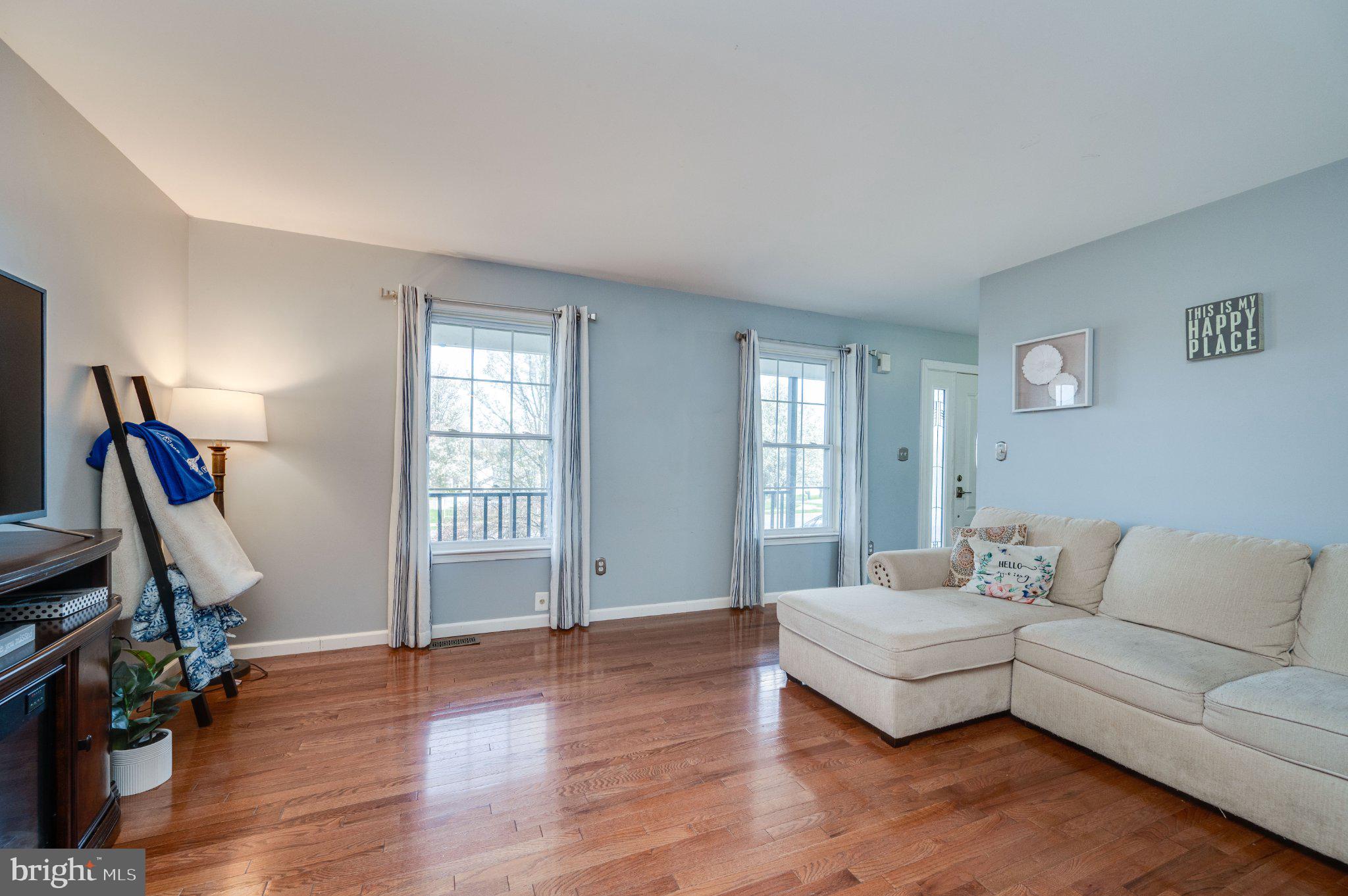 4870 Dunham Drive Reading, PA 19606 - Photo 16 of 59 a living room with furniture and a flat screen tv