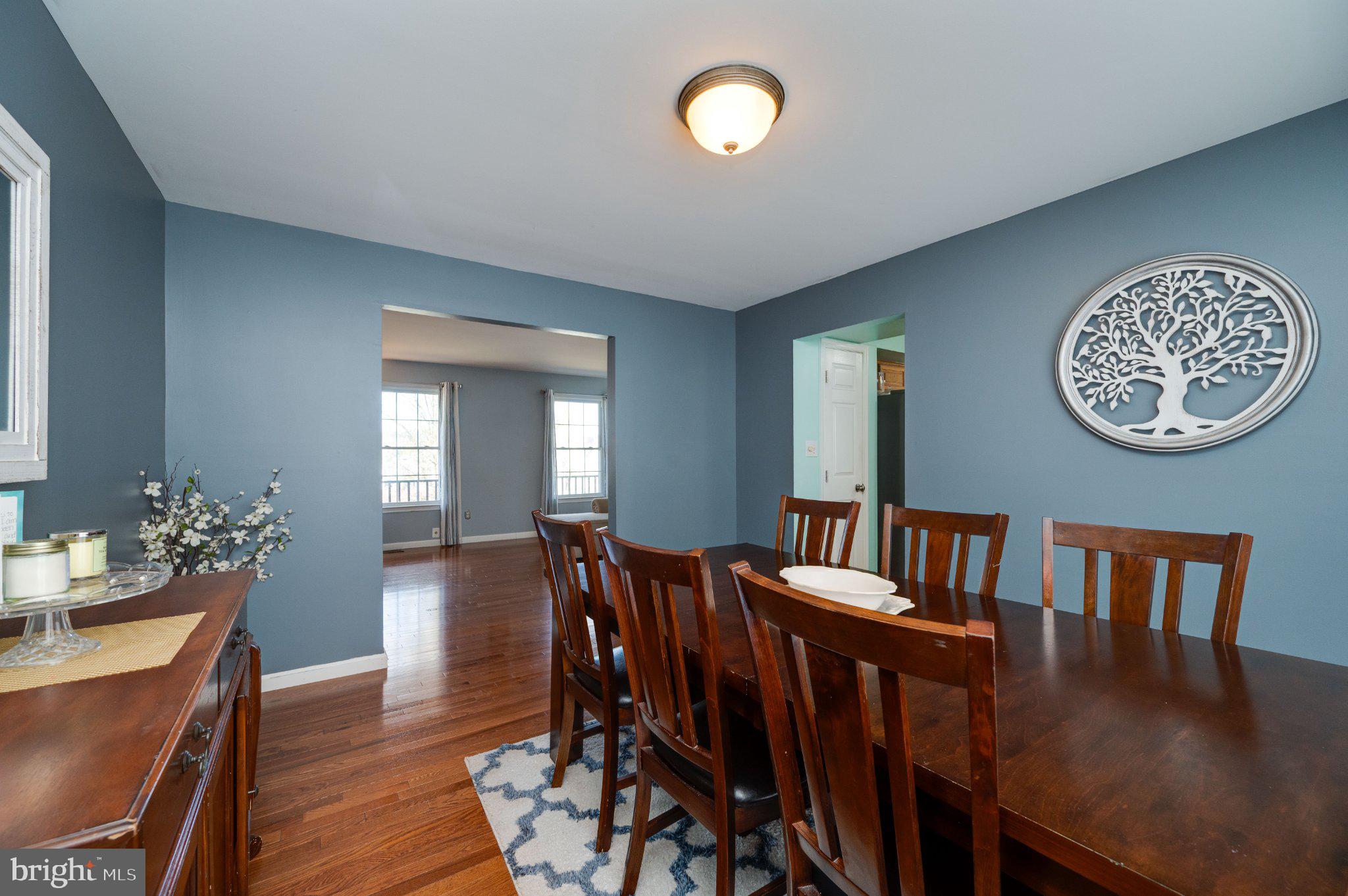 4870 Dunham Drive Reading, PA 19606 - Photo 22 of 59 a view of a dining room with furniture and wooden floor
