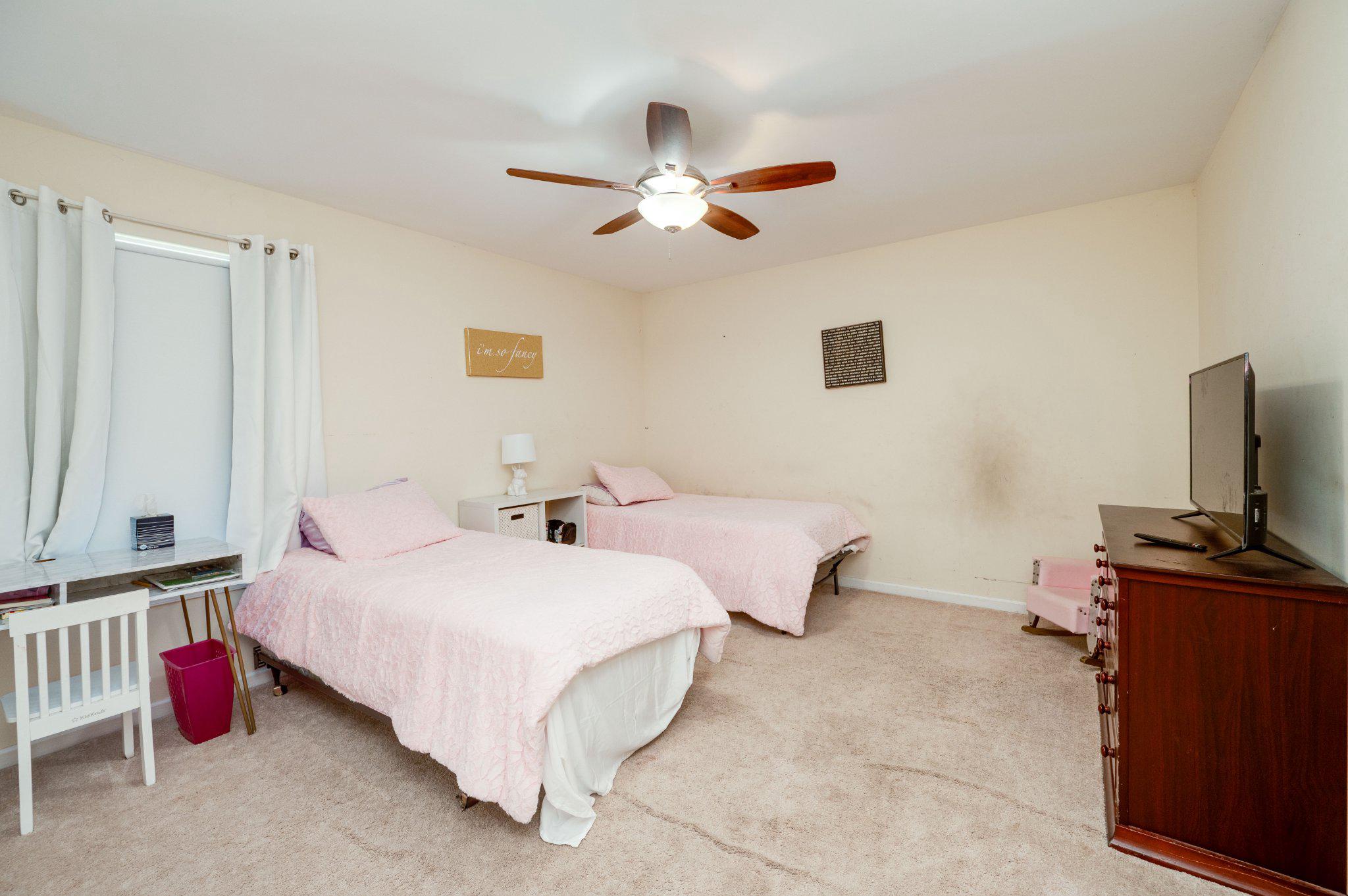 4870 Dunham Drive Reading, PA 19606 - Photo 47 of 59 a bedroom with bed and a flat tv screen