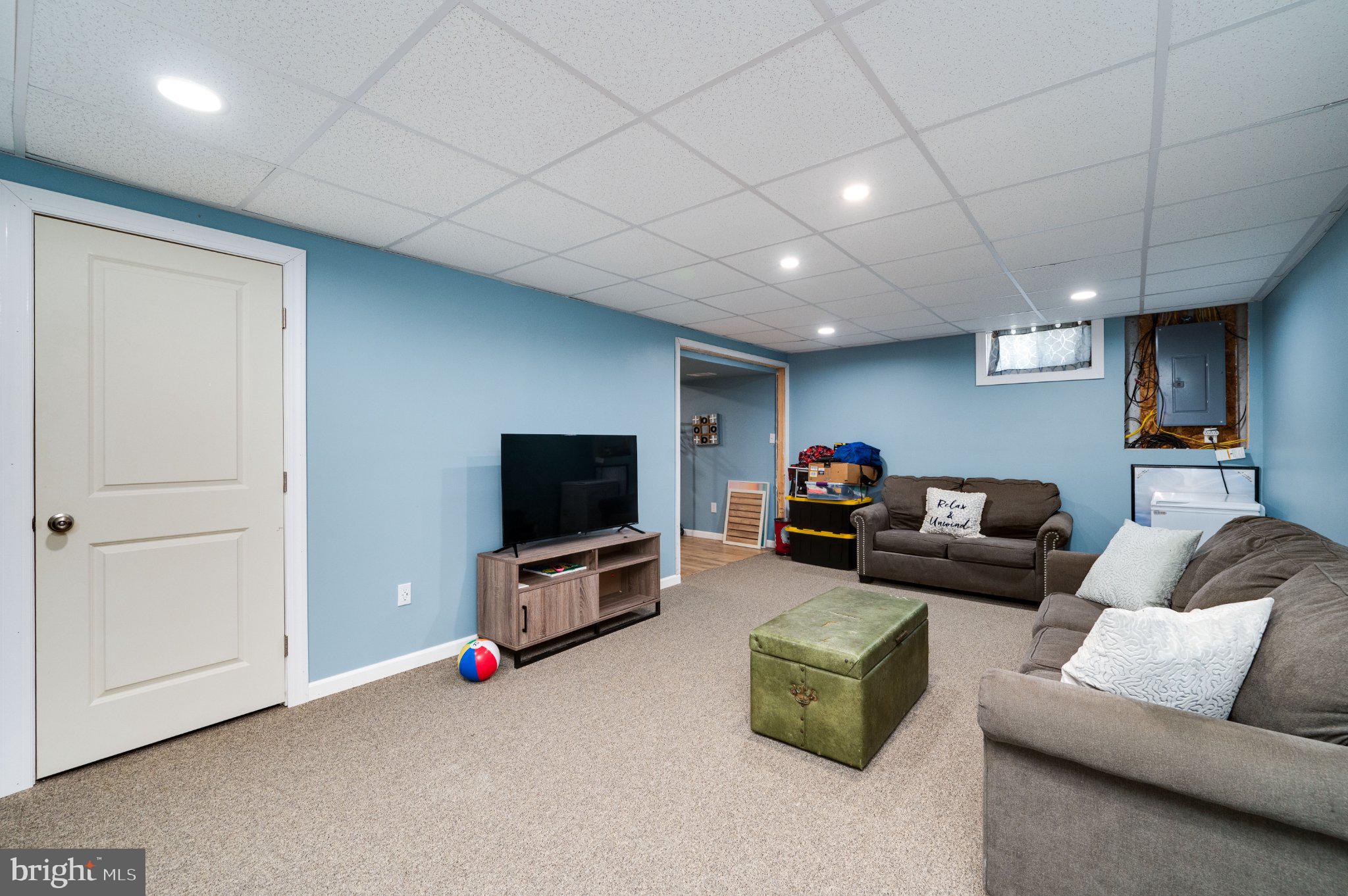 4870 Dunham Drive Reading, PA 19606 - Photo 54 of 59 a living room with furniture and a flat screen tv