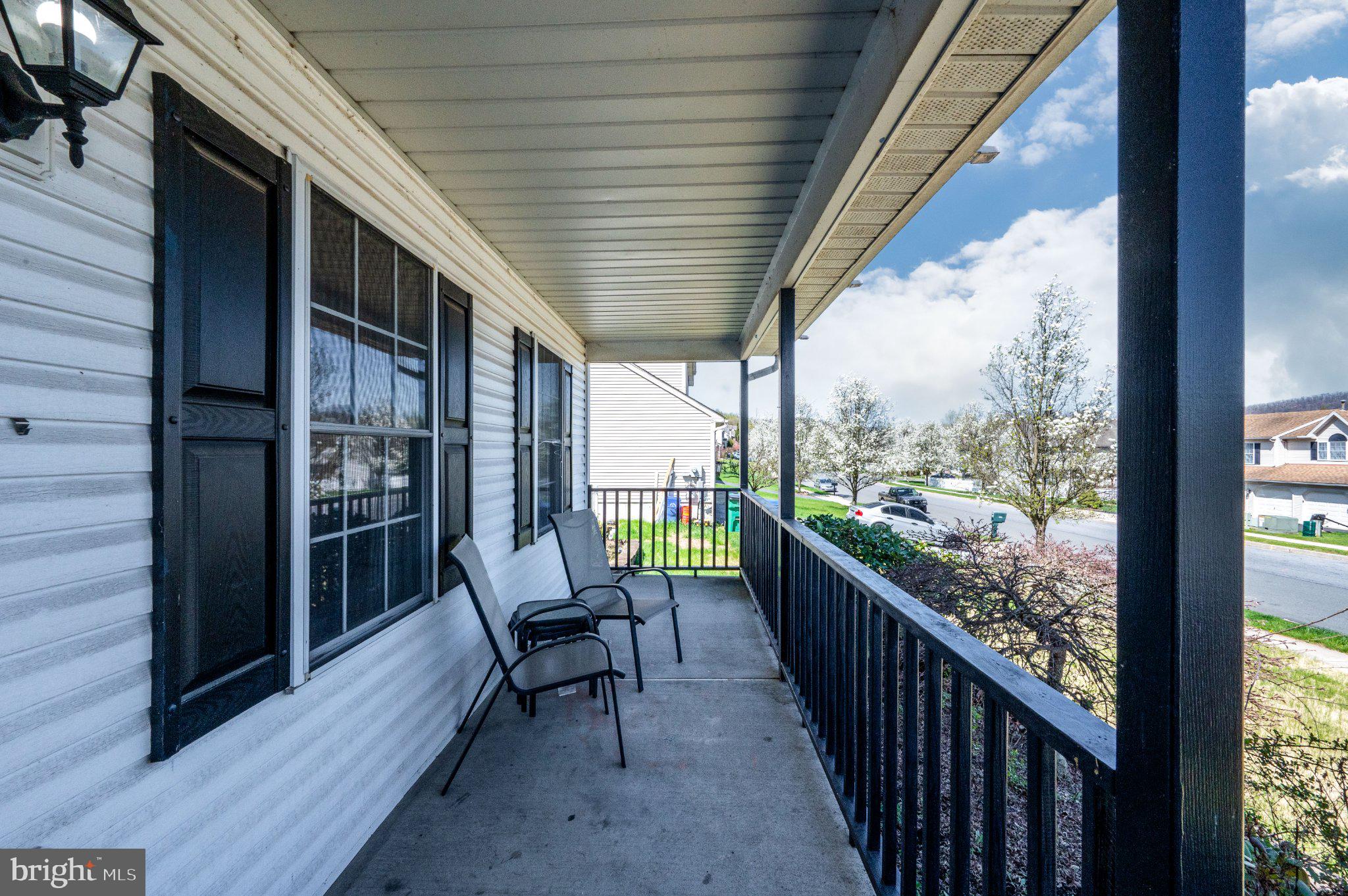 4870 Dunham Drive Reading, PA 19606 - Photo 6 of 59 Charming porch with inviting views.