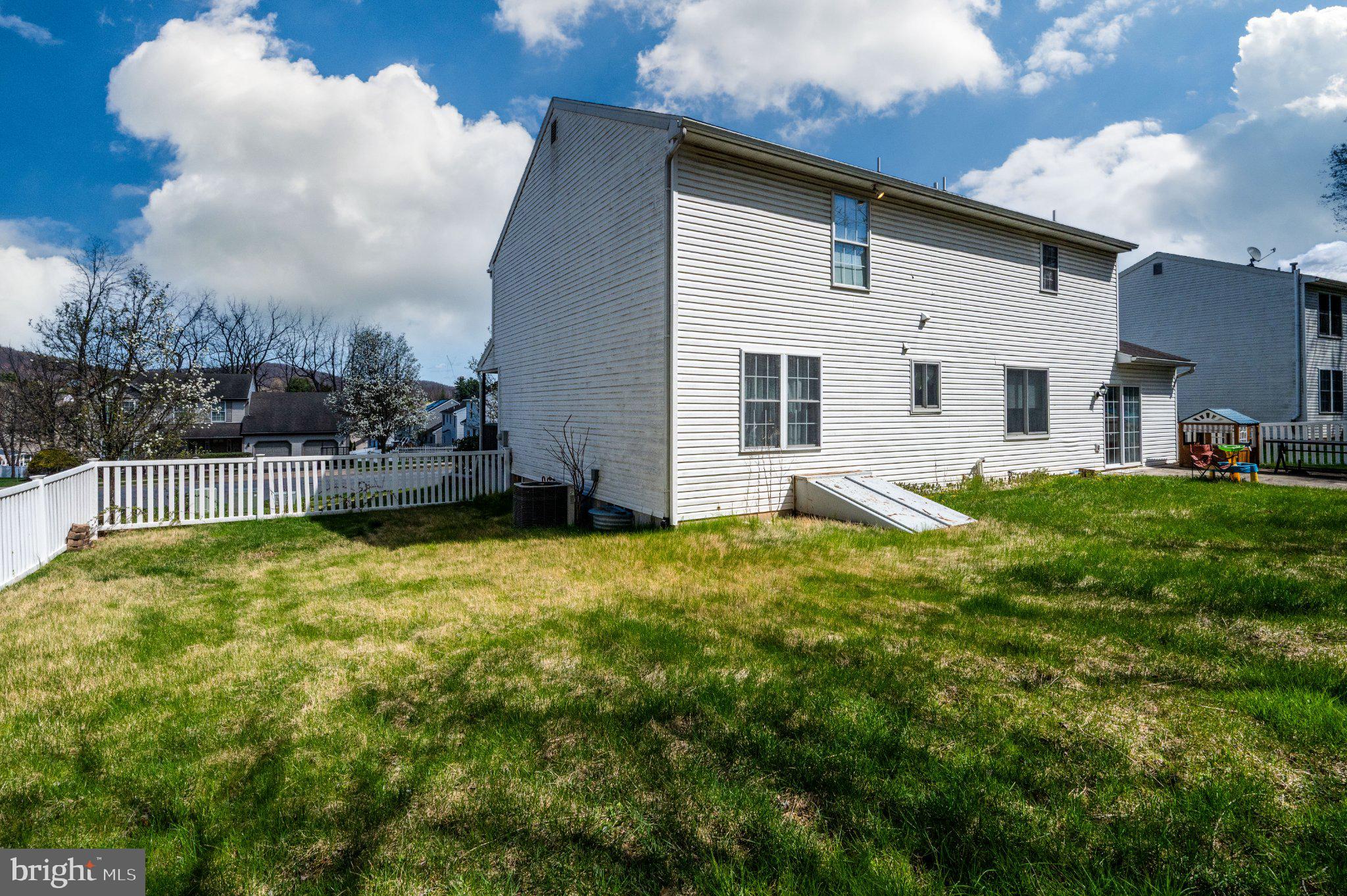 4870 Dunham Drive Reading, PA 19606 - Photo 7 of 59 a view of a house with backyard and sitting area