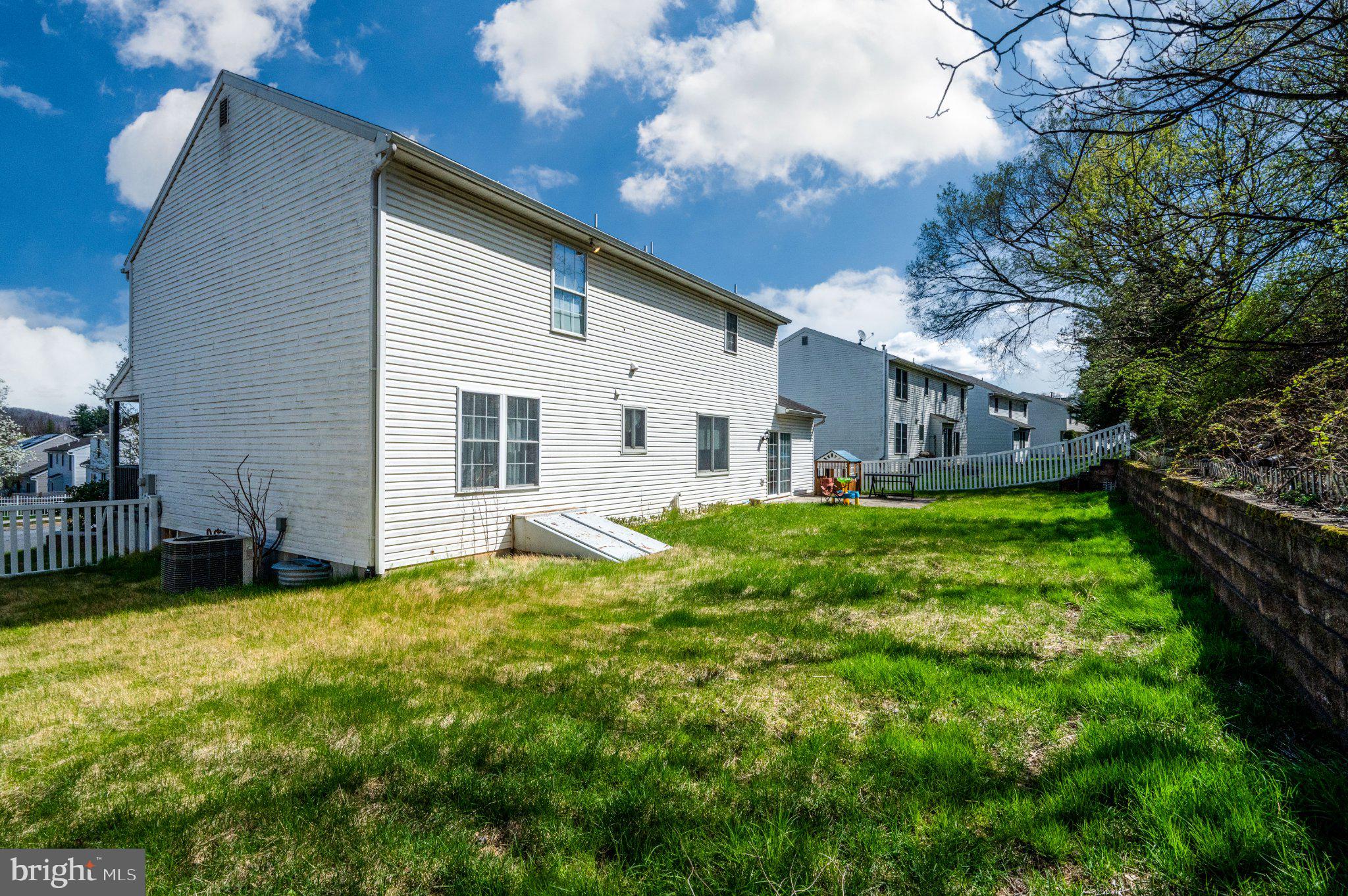 4870 Dunham Drive Reading, PA 19606 - Photo 8 of 59 Spacious backyard with sunny skies.