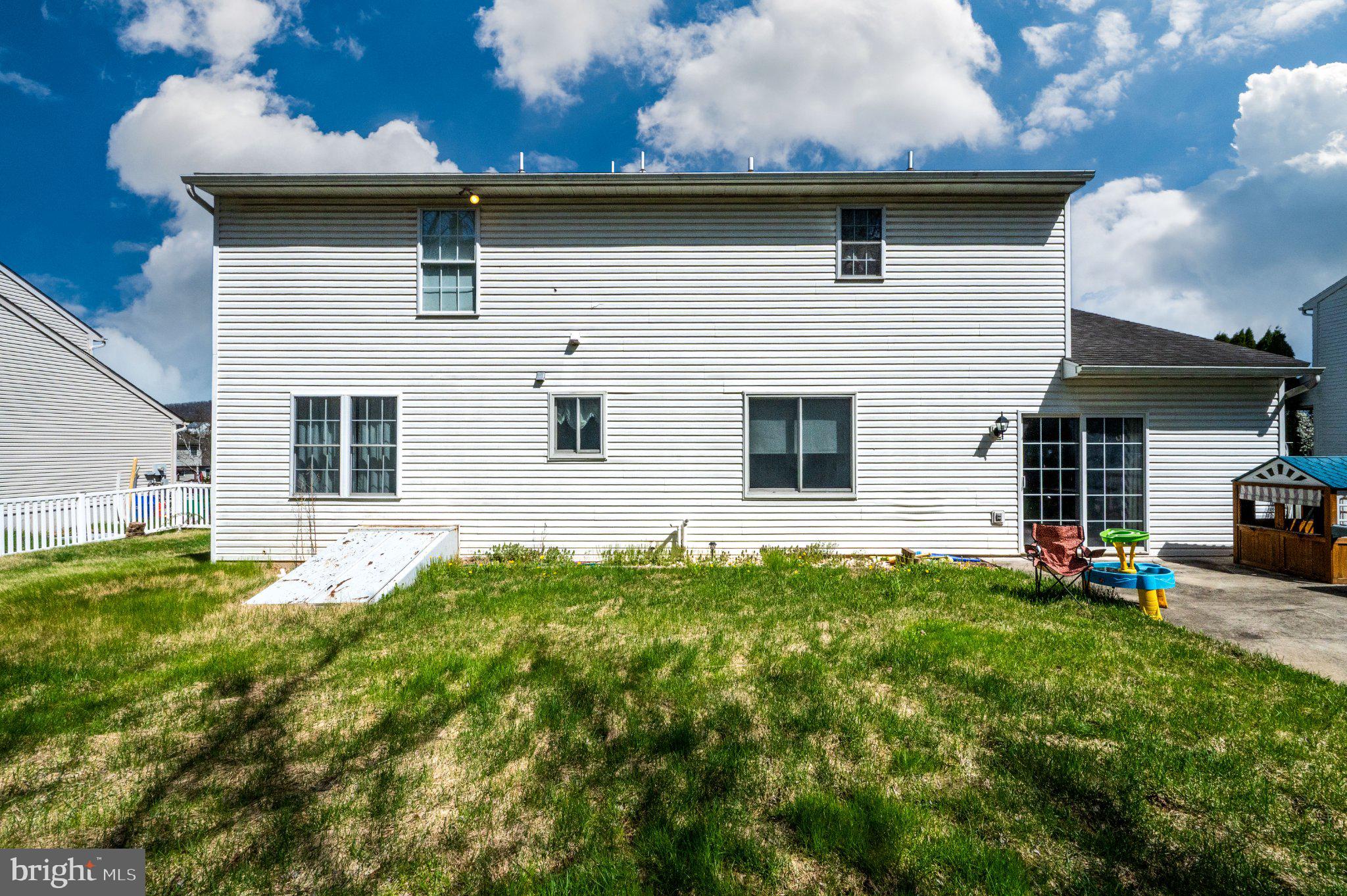 4870 Dunham Drive Reading, PA 19606 - Photo 9 of 59 a view of a house with a yard