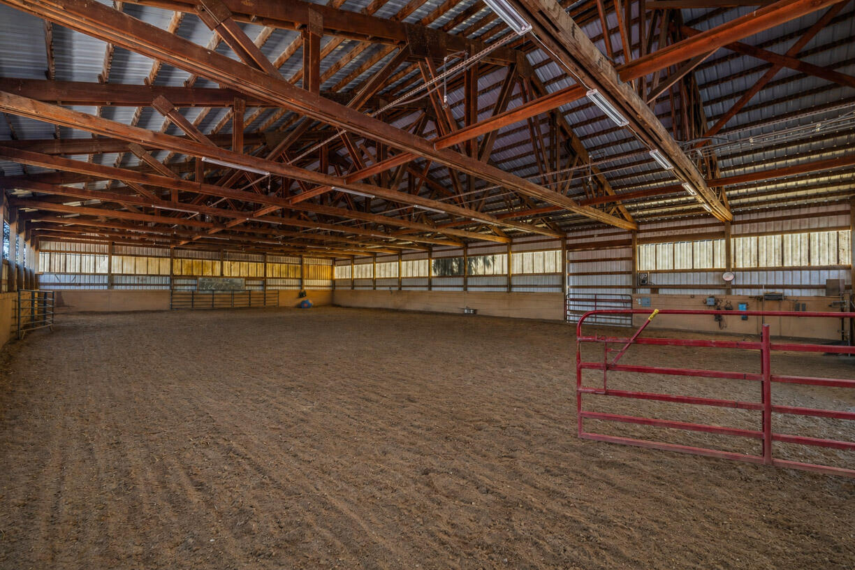 67500 Harrington Loop Road Bend, OR 97703 - Photo 27 of 72 a view of empty room with wooden floor