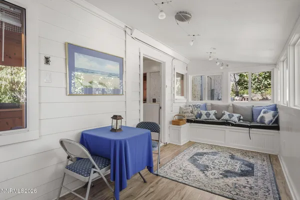 a living room with a couch and a table