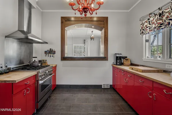 a kitchen with a stove top oven