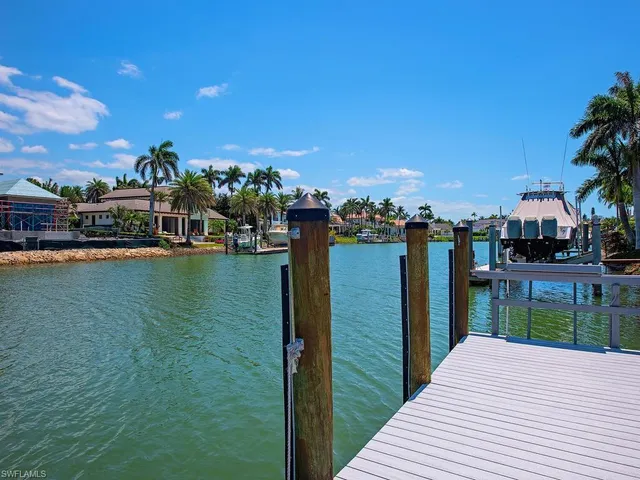 a view of a lake with a house