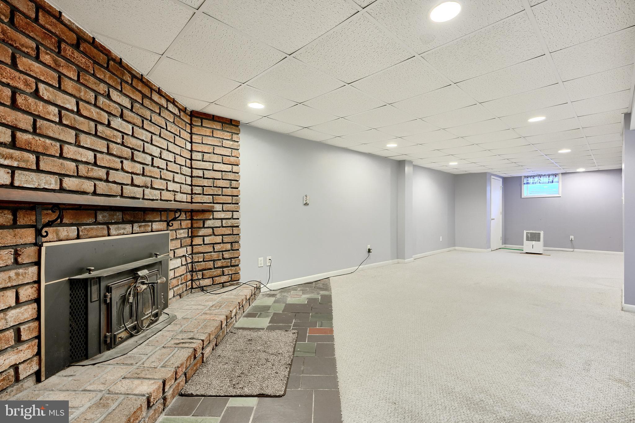 407 Crisfield Road Baltimore, MD 21220 - Photo 19 of 31 Fireplace in Basement