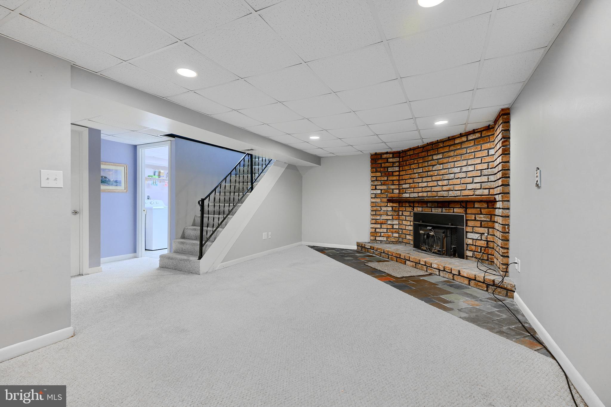 407 Crisfield Road Baltimore, MD 21220 - Photo 20 of 31 Fireplace in Basement