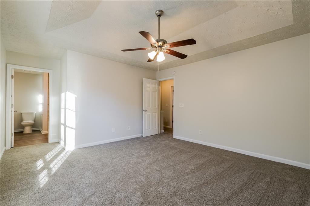 4011 Riverside Parkway Decatur, GA 30034 - Photo 15 of 27 a view of an empty room and a ceiling fan