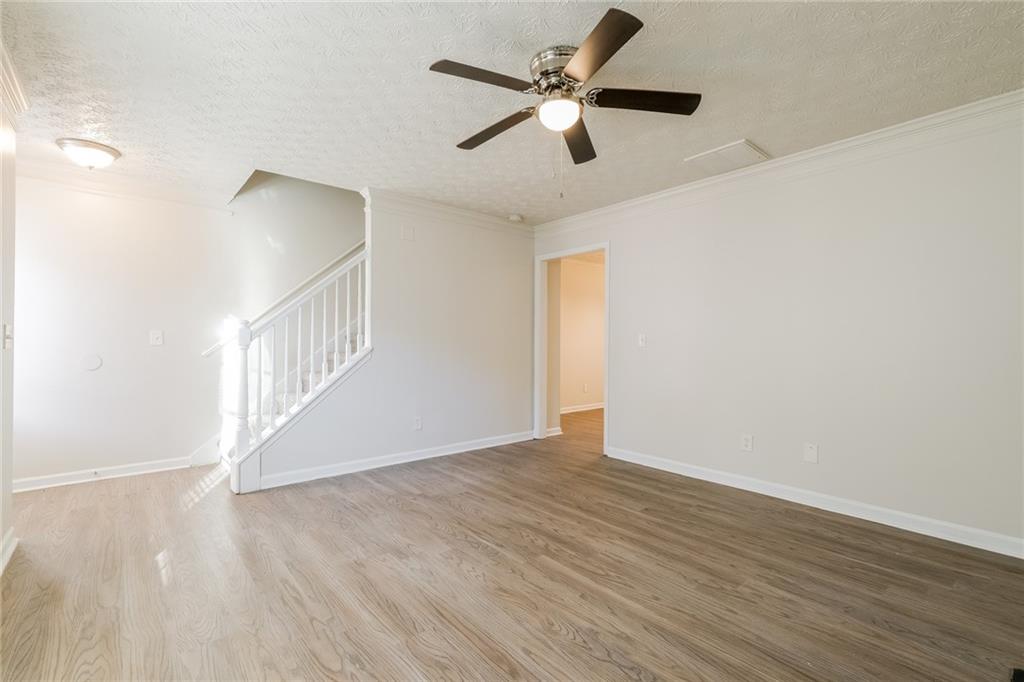 4011 Riverside Parkway Decatur, GA 30034 - Photo 7 of 27 wooden floor in an empty room with a window