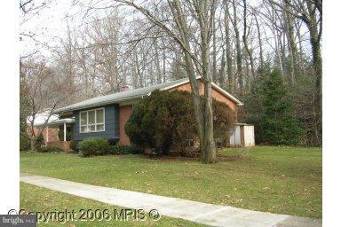 10327 Royal Road Silver Spring, MD 20903 - Photo 1 of 14 a view of a house with a yard