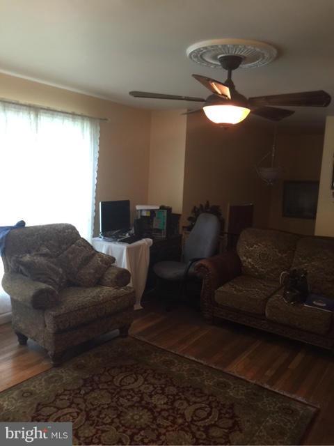 10327 Royal Road Silver Spring, MD 20903 - Photo 11 of 14 a living room with furniture and a window