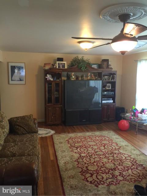 10327 Royal Road Silver Spring, MD 20903 - Photo 12 of 14 a living room with furniture
