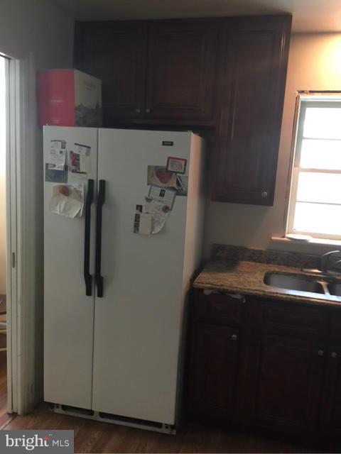 10327 Royal Road Silver Spring, MD 20903 - Photo 8 of 14 a room with water heater and window