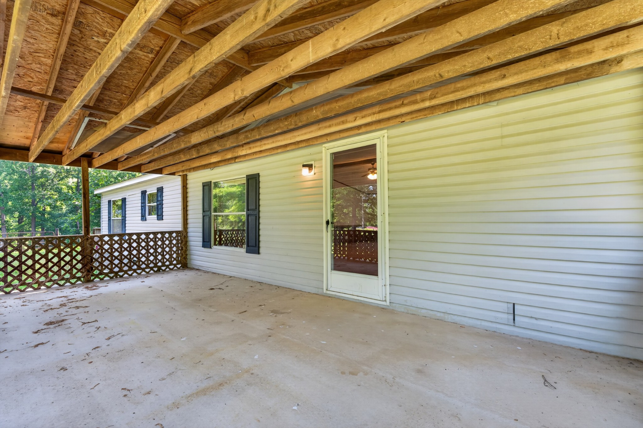 228 Shasteen Ridge Road Lynchburg, TN 37352 - Photo 38 of 53 a view of a house with a garage
