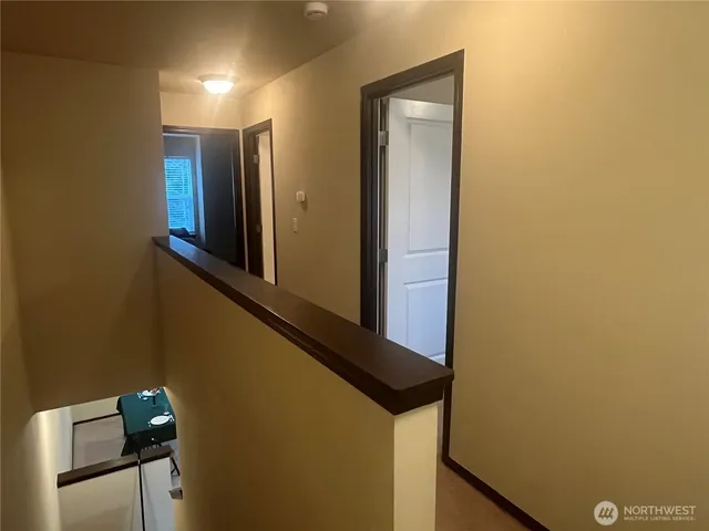 a view of hallway with stairs