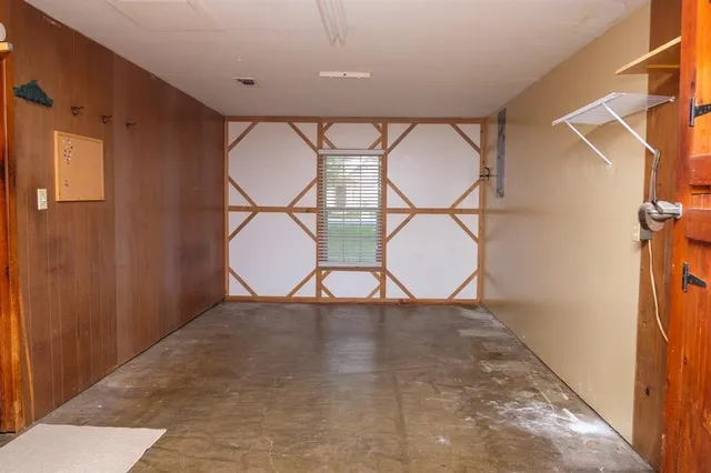 a view of a hallway with a furniture