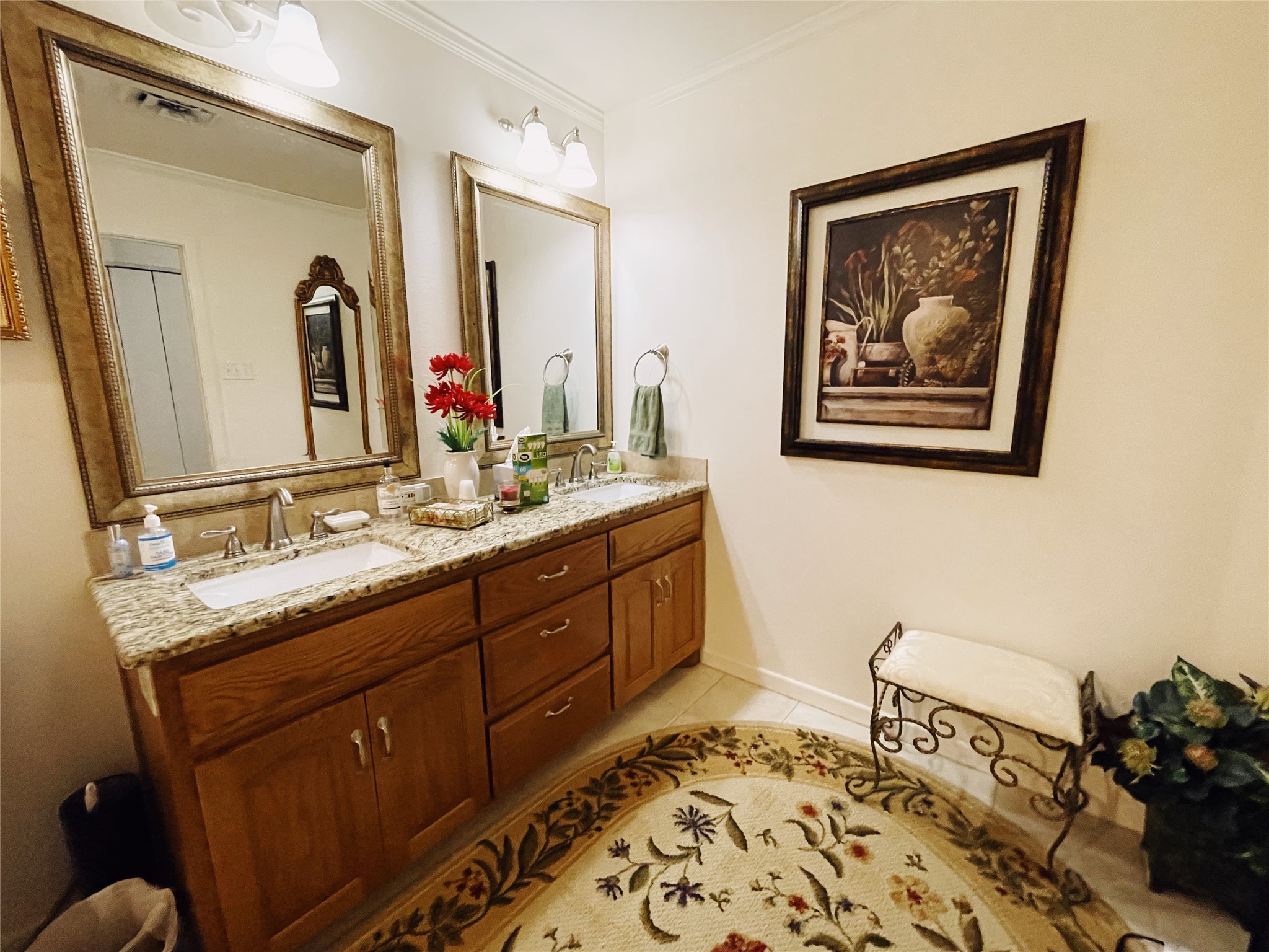 700 Shanklin Road Belton, TX 76513 - Photo 27 of 33 a spacious bathroom with a double vanity sink and a mirror