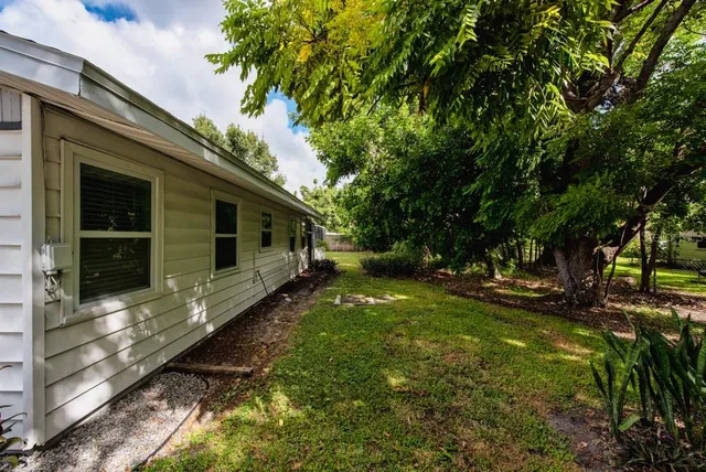 a view of a back yard of the house