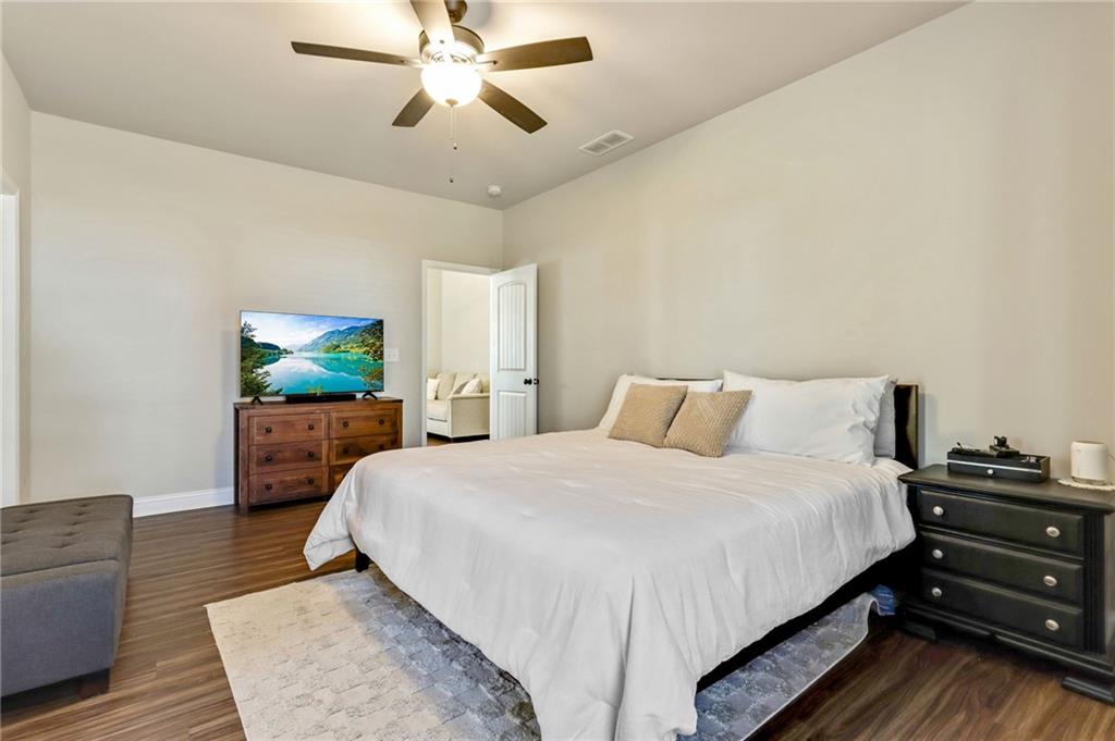 391 Mulberry Rock Road Temple, GA 30179 - Photo 14 of 25 a bedroom with a bed and a couch