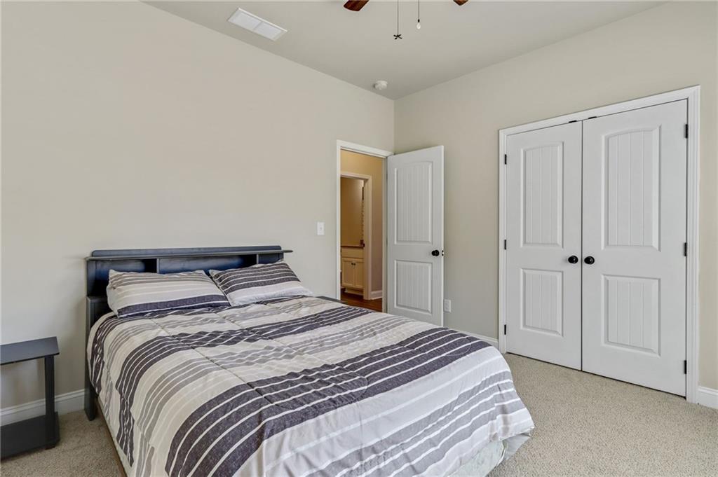 391 Mulberry Rock Road Temple, GA 30179 - Photo 18 of 25 a bedroom with a bed and a window