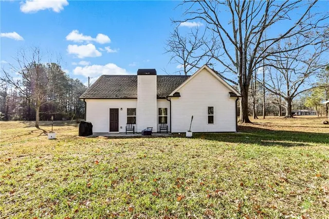 a house view with a garden space