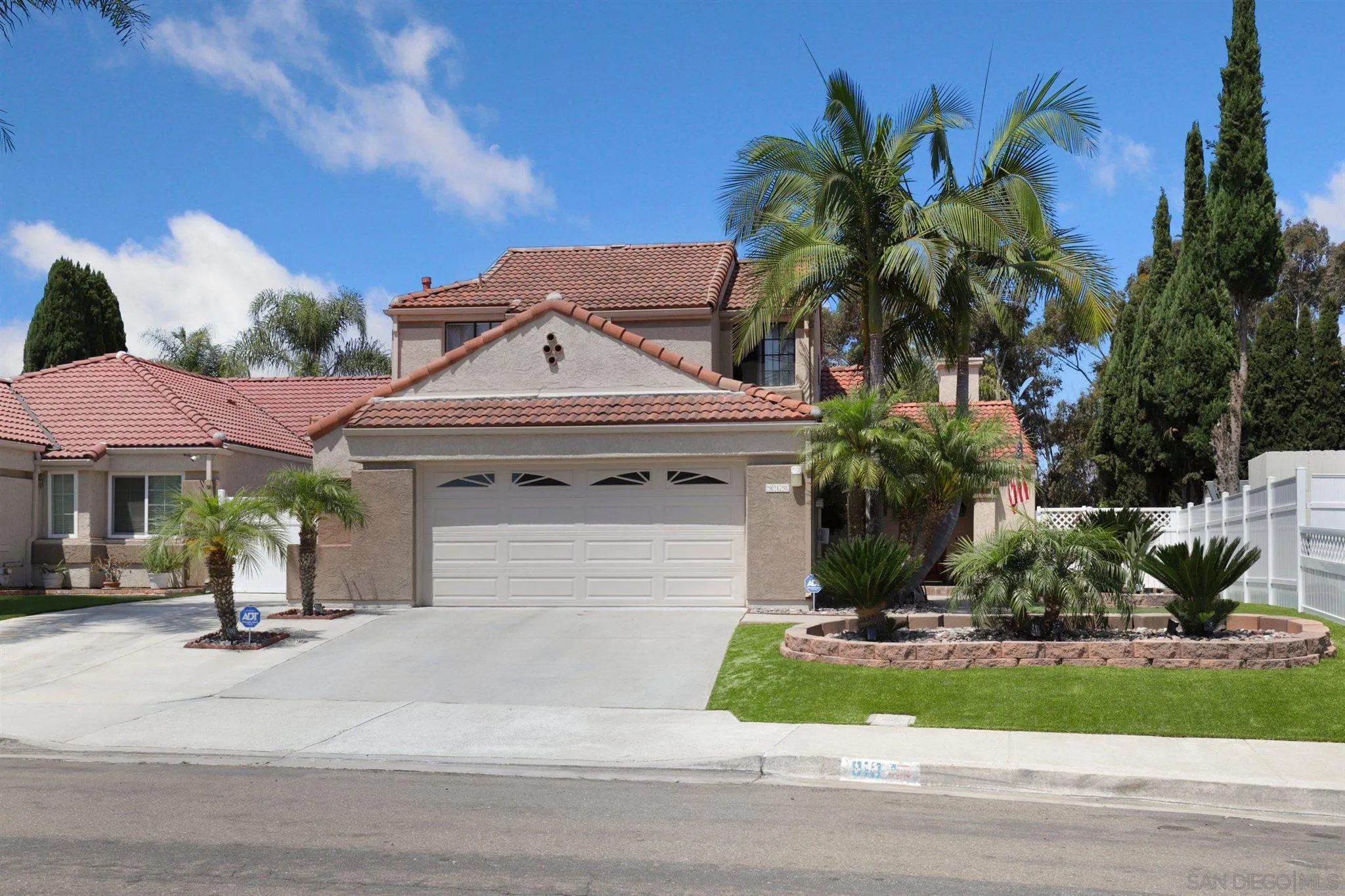 910 Redbud Road Chula Vista, CA 91910 - Photo 1 of 33 a front view of a house with a yard