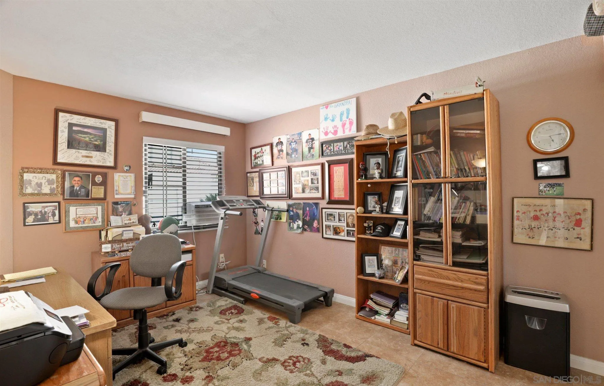 910 Redbud Road Chula Vista, CA 91910 - Photo 13 of 33 a room with furniture a air conditioner and a window