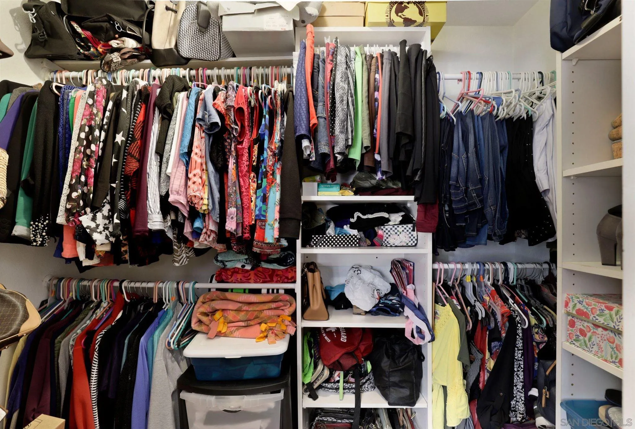 910 Redbud Road Chula Vista, CA 91910 - Photo 18 of 33 a view of walk in closet with clothes and shoes